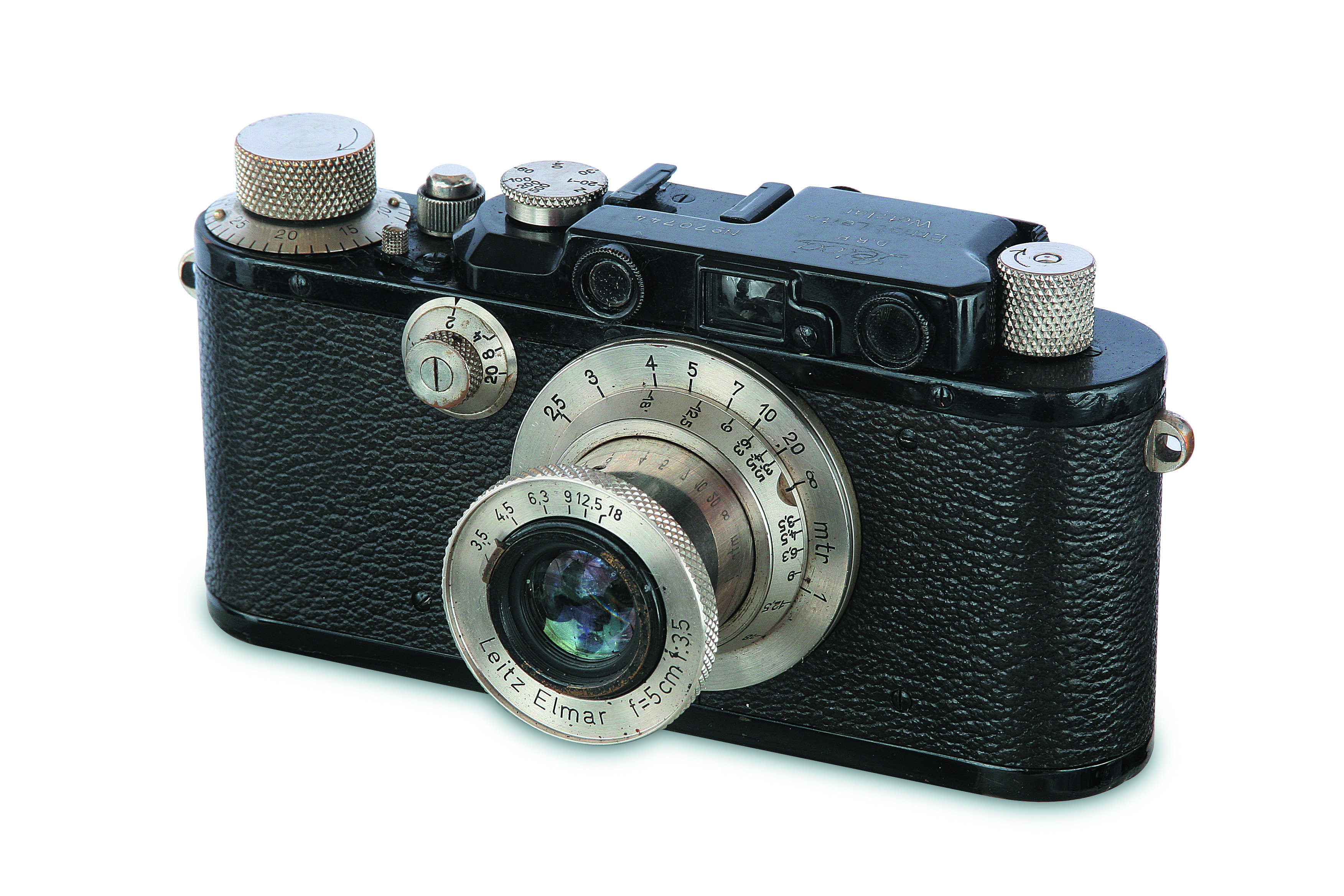 O modelo Leica III, de 1933, evolução da Leica I, que passou a ser usada em fotojornalismo por seu discreta e leve